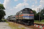 AMTK 90368 still in Phase III leads Hiawatha train 338 south (RR east)